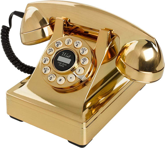 Classic gold rotary phone with a vintage design and traditional dialing features.